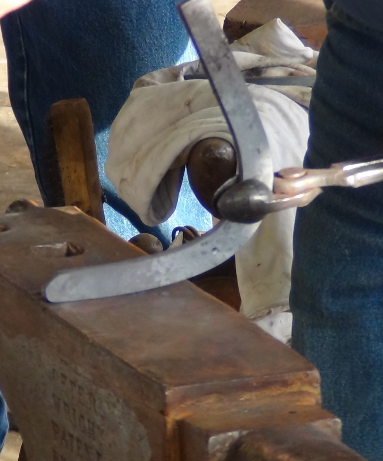 Working on face and at opposite edge of anvil, form your heels and heel check.