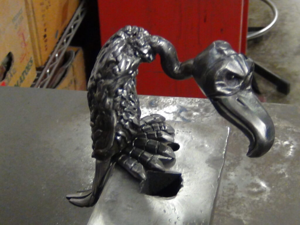 Big Daddy sitting on the anvil. Tom made the pieces to be able to set and keep an eye on his work.