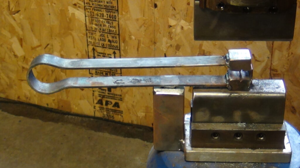 Roy's spring tool for veining the feathers.