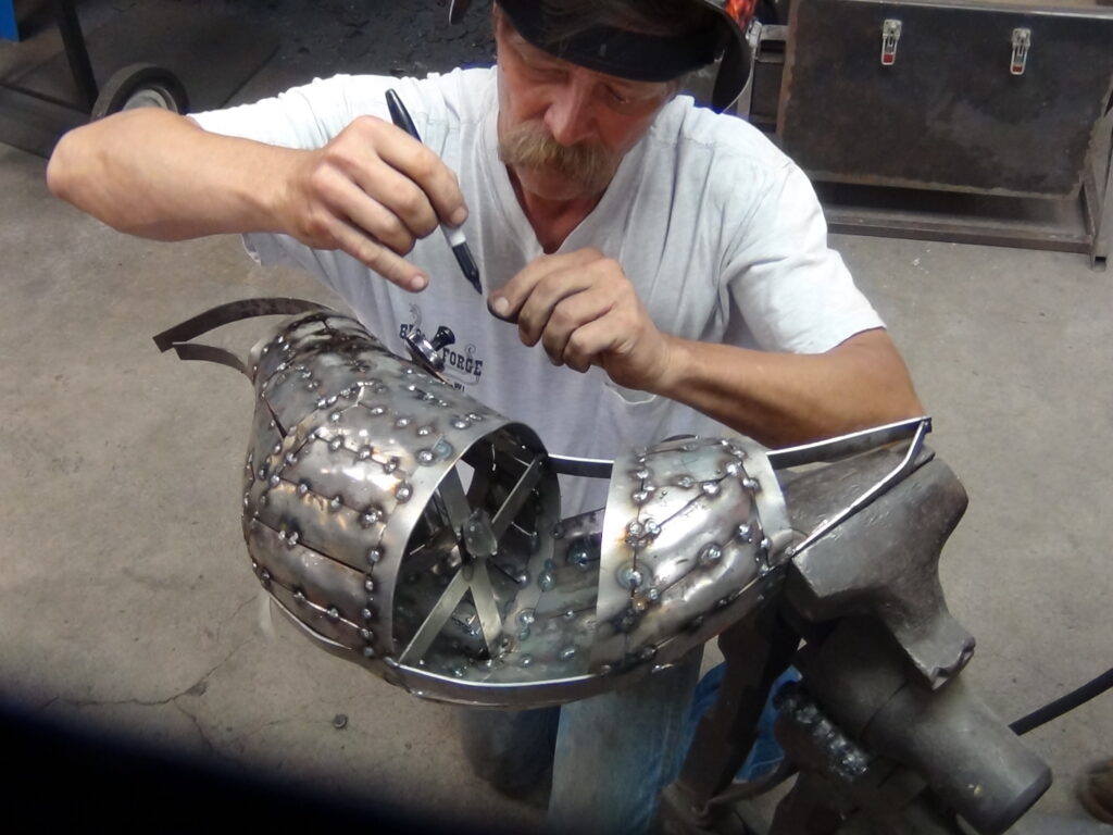 Body Building - Roy Bloom continued working through the formation of the body, meticulously cutting and welding the strips to provide the surface for the feathers.