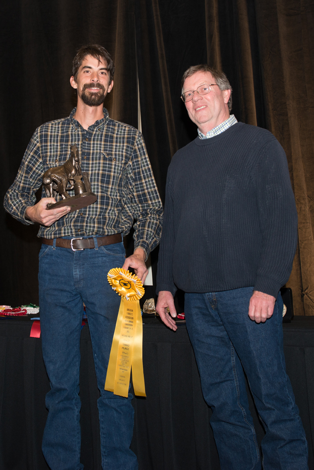 Cole McElroy, high point winner, poses with Dan Burke of FPD.